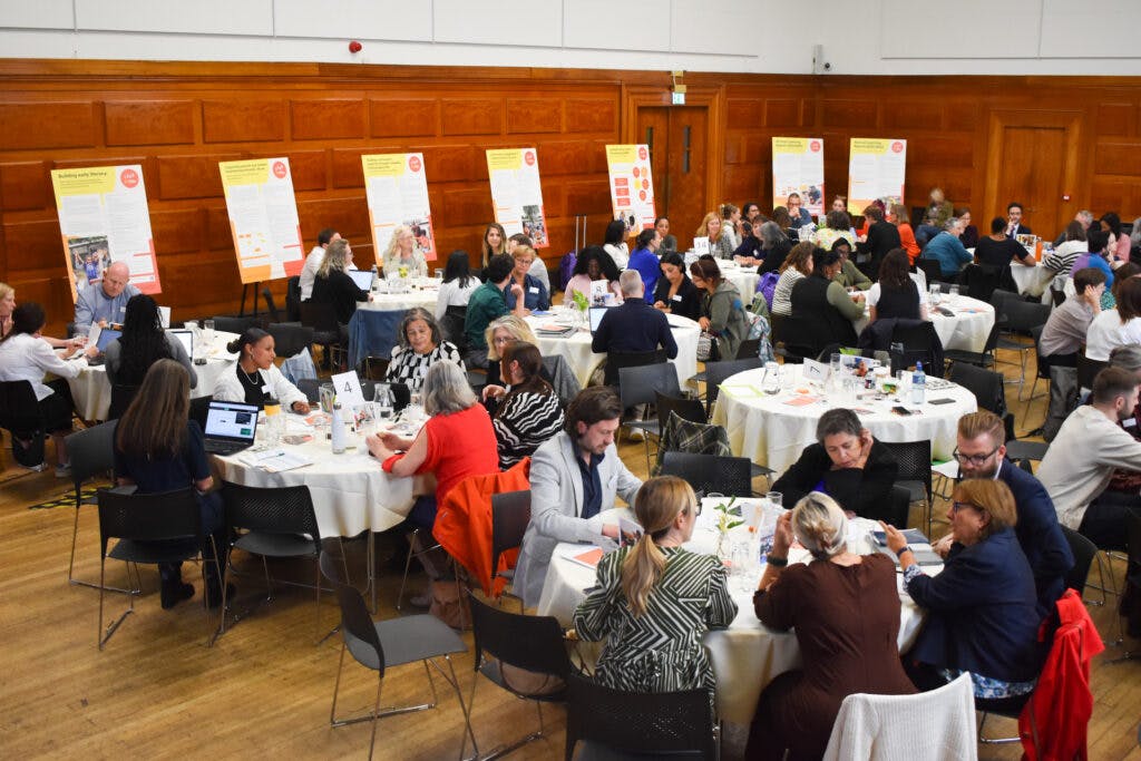 Tables of attendees at LEAP's learning event: 10 years of LEAP