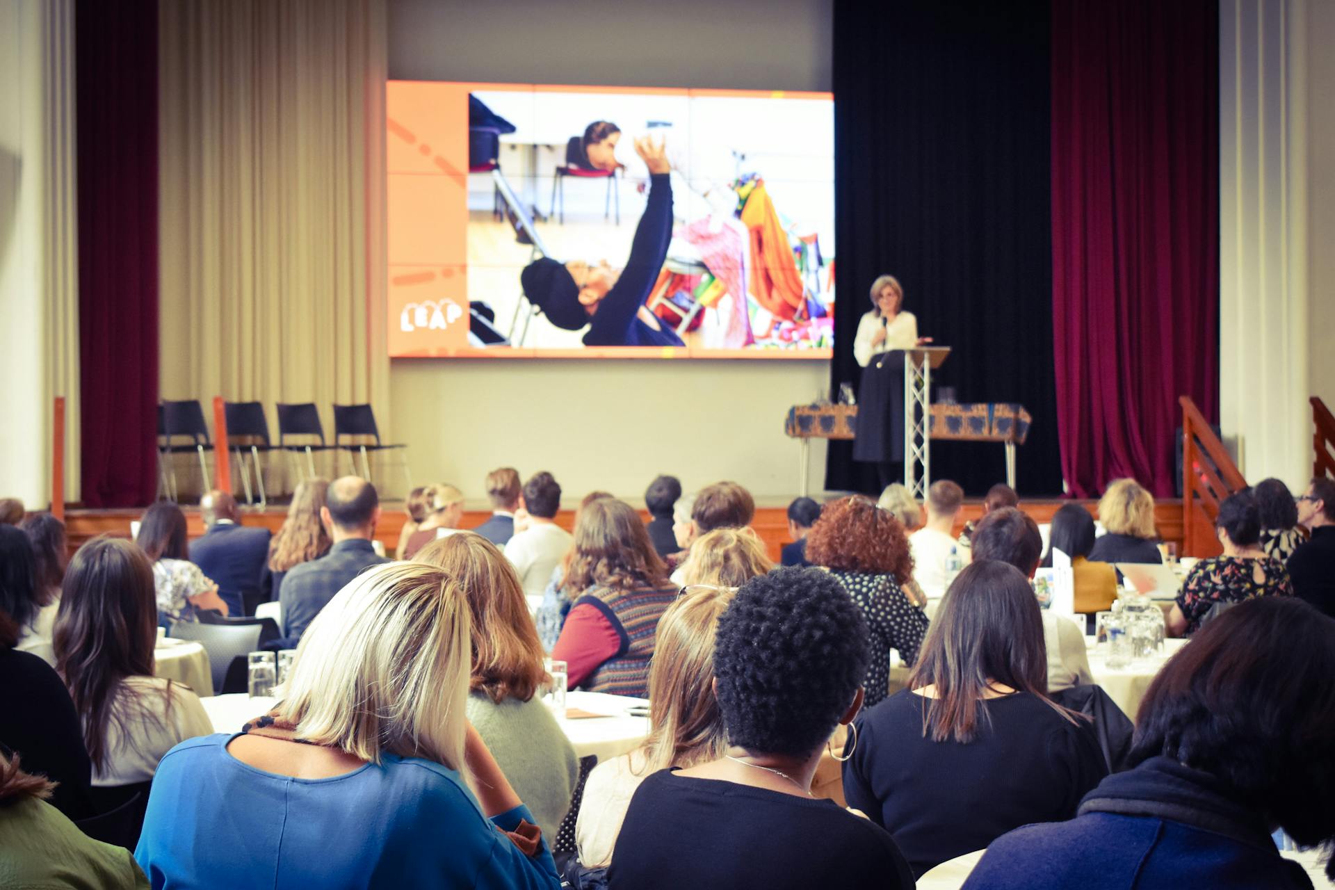 The view from the back of the conference. A speaker addresses the room at LEAP's learning event: 10 years of LEAP